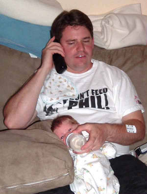 Who says Daddy can't multi-task