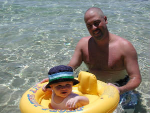 Daddy taking Devin for a swim